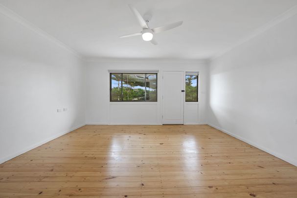 Freshly Renovated Coastal Home - Lawn Maintenance Included - Photo 1