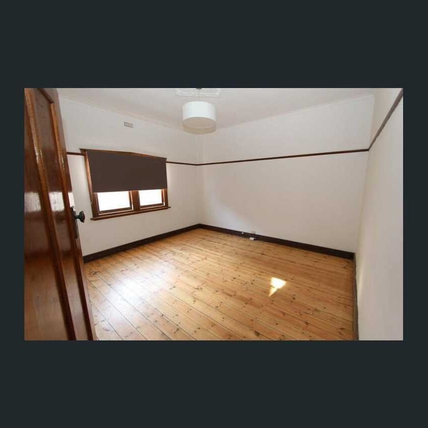 Charming 3-Bedroom Home with Classic Appeal in Prime Location - Photo 1