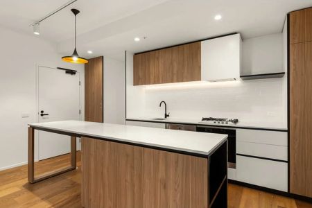 Modern Scandinavian-Style One-Bedroom + Study Apartment Moments from the CBD - Photo 3