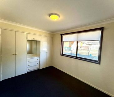 TIDY UNIT IN CONVENIENT LOCATION - Photo 2