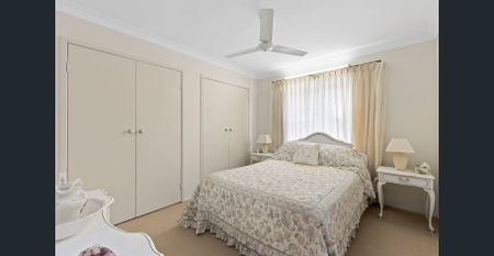 Waterfront Family Home with Pool & Triple Garage - Photo 4