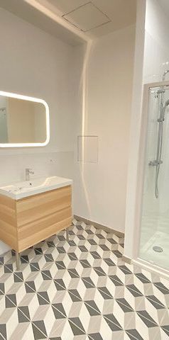 A LOUER APPARTEMENT 2 CHAMBRES CENTRE VILLE DE ST QUENTIN 02100 - Photo 2