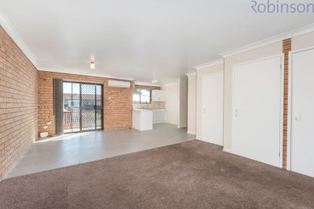 Spacious townhouse with parking for two vehicles. - Photo 2