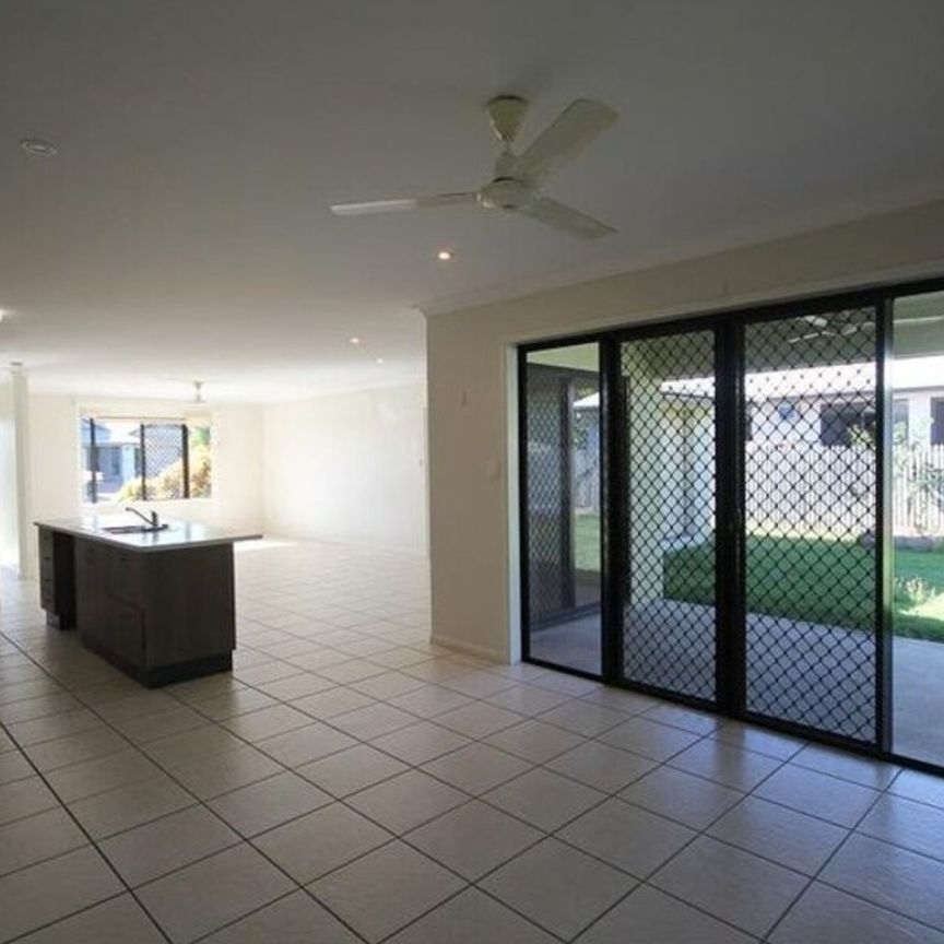 Nestled in Bushland Beach&colon; a 4-Bedroom Modern Comfort Home - Photo 1