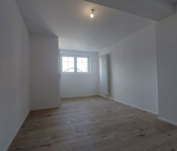 Appartement de 2,5 pièces au 2ème étage avec jardin commun - Photo 3