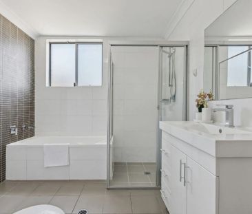 Spacious with Stylish Interiors, Ultra-Convenient 2 bedroom Unit - Photo 3