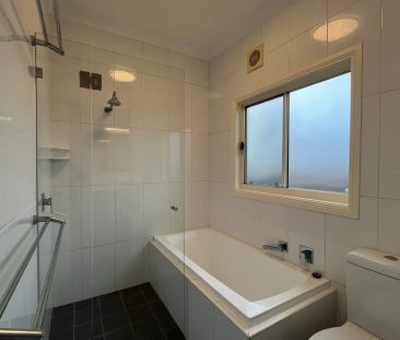 Three Bedroom Home with Sunroom - Photo 1