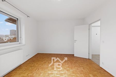 Exklusive Dachgeschosswohnung mit Fernblick – urbanes Wohnen auf höchstem Niveau - Photo 4