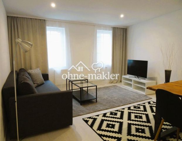 zentral, dennoch ruhig. Moderne und helle Wohnung mit Stellplatz - Foto 1