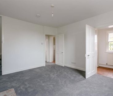 An updated two bedroom semi-detached cottage located in the village... - Photo 2