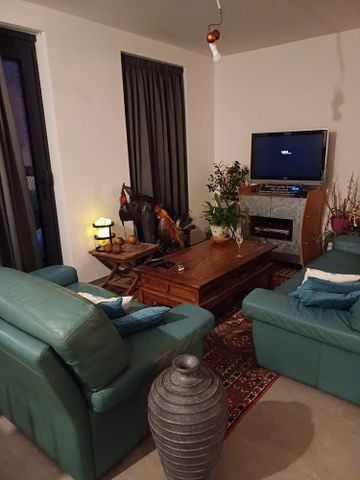 Gelijkvloers appartement met ruim terras, parkingplaats en extra berging - Photo 2