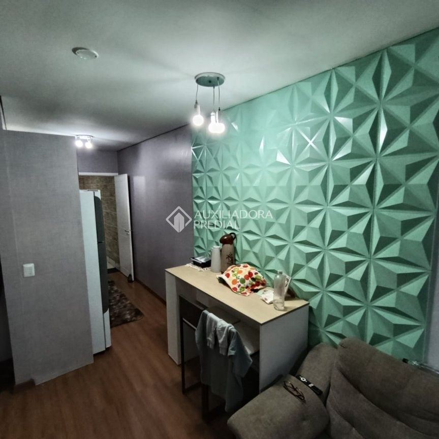 Casa Geminada com 2 quartos e 44m² para alugar em Chácara das Rosas, Cachoeirinha. - Photo 1