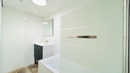 A LOUER APPARTEMENT DE TYPE 3 MEUBLE - SAINT ANDRE DE CUBZAC CENTRE - Photo 4