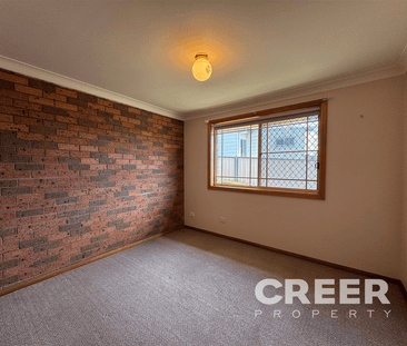SECURE TWO BEDROOM UNIT IN GREAT LOCATION - Photo 3