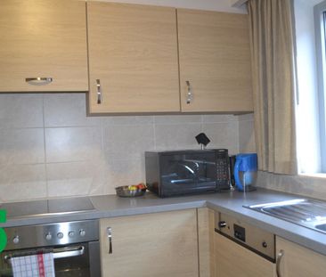 Nabij het centrum gelegen ruim appartement met staanplaats en 2 sla... - Foto 6