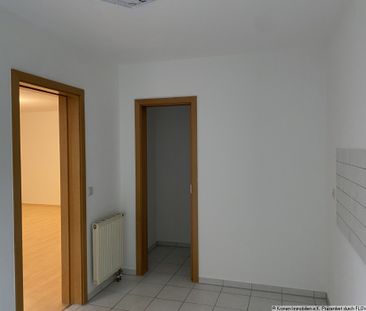 3-Zimmer-Erdgeschosswohnung mit eigenem Garten und Tiefgaragenstell... - Foto 2