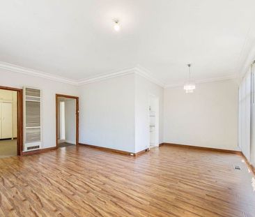 SPACIOUS FOUR BEDROOM HOME IN THE HEART OF CLAYTON- - Photo 4
