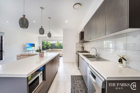 Ultra-Modern Family Home in the Heart of Marsden Park - Photo 2