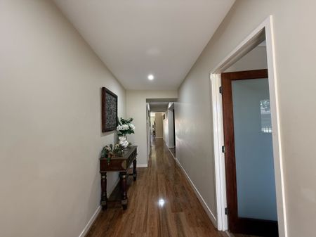 Spacious 4-Bedroom Home with Two Living Areas and Modern Upgrades - Photo 4