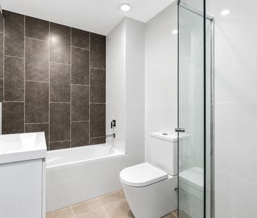 Stylish Two-Bedroom Apartment In A Highly Sought After Complex - Photo 3