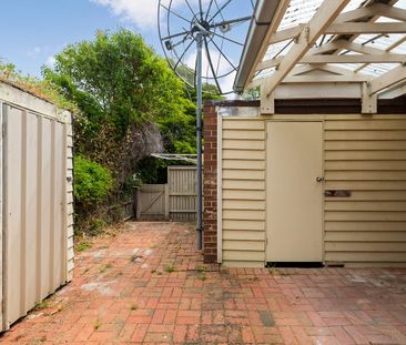 A spacious unit within walking distance to everything - Photo 1