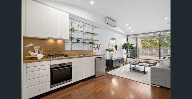 Dual Level Two Bedroom Apartment with Secure Parking, EV Charger + Separate Storage - Offered Unfurnished - Photo 1