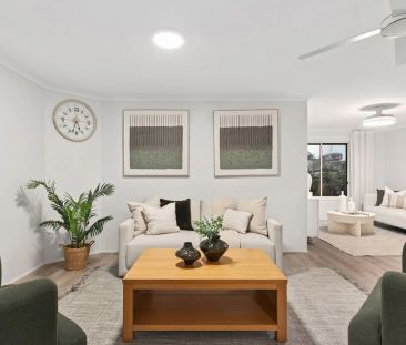 A stylish newly renovated home in one of Wishart's most sought-afte... - Photo 2