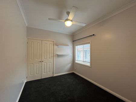 Three Bedroom Home with Sunroom - Photo 5