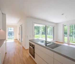 Großzügige 4-Zimmer-Gartenwohnung für Familien - ERSTBEZUG | Rondelle XIV Top 1 - Photo 1