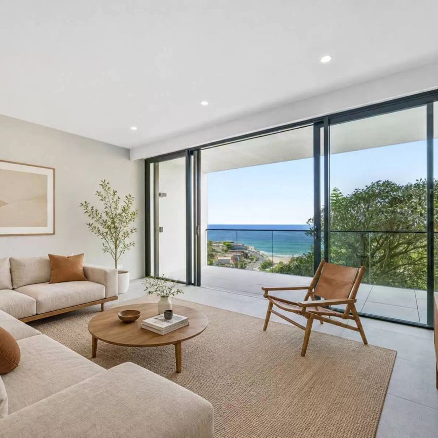 Stylish One-Bedroom Designer Beachside Apartment with Spectacular Views and Secure Parking - Photo 1