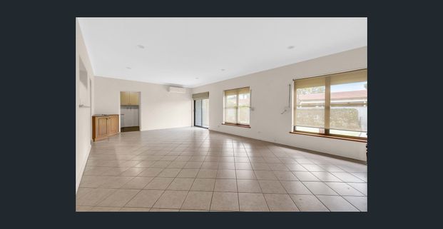 Hi, I’m spacious, secure living with room to unwind in the heart of Brooklyn Park - Photo 1