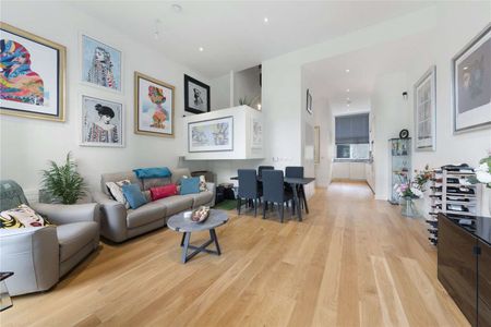SINGLE HOUSEHOLD ONLY. The property comprises of an open plan kitchen and reception room, master bedroom with en-suite and access to a private balcony. - Photo 3