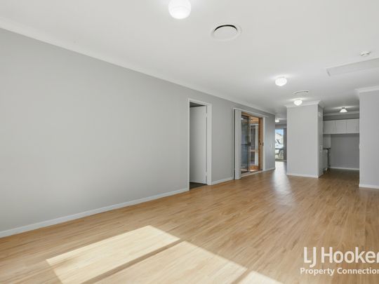 SPACIOUS 4-BEDROOM HOME WITH RENOVATED INTERIORS - Photo 1