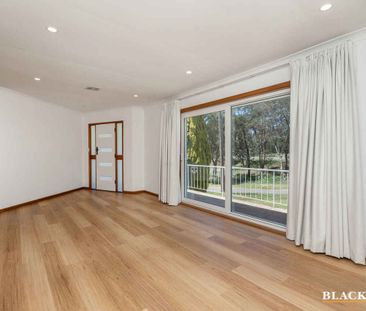 A Renovated 4-Bedroom Gem with Endless Potential - Photo 6