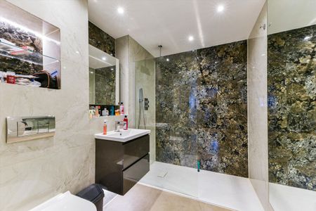 Spacious ground floor apartment with exceptional private garden, offering over 1,200 sq ft of lateral living in a modern Kilburn development. - Photo 4
