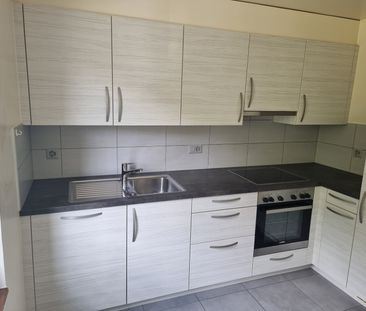 Appartement de 3 pièces au 1er étage avec part au grand jardin commun - Photo 5