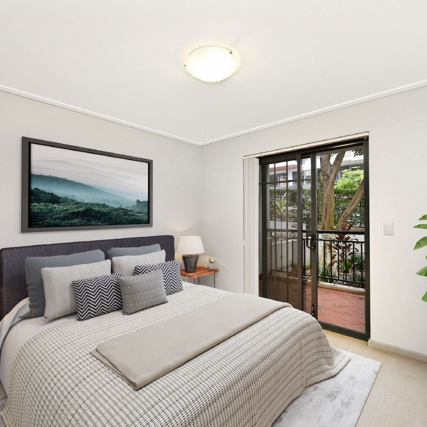 Garden Apartment with Open Plan Living and Double Balconies - Photo 1