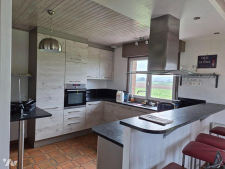 Dans un environnement calme et verdoyant, découvrez cette belle maison individuelle semi plain-... - Photo 5