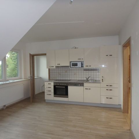 DACHGESCHOSSWOHNUNG MIT GEMEINSCHAFTSGARTEN IN AUSGEZEICHNETER WOHNLAGE - Photo 1