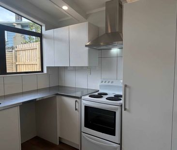 Stylish Renovation with Loads of Parking & West-Facing Deck ! - Photo 3