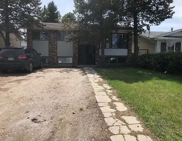 Large Bi-Level House in Millwood with Two Kitchens | 4903 18 Avenue Northwest, Edmonton - Photo 1