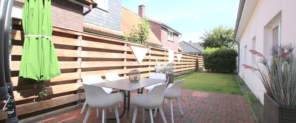Stilvolle Erdgeschosswohnung mit Einbauküche und Terrasse in Wiefelstede / Zentrum - Foto 1