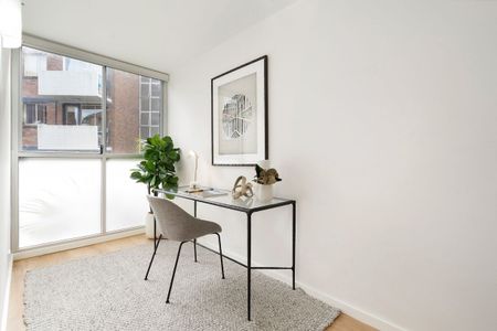 Peaceful rear-of-block apartment in a prime walk-to-everything location - Photo 3