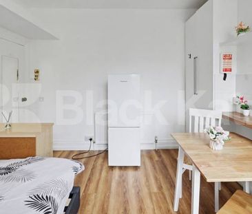 A well-presented self-contained studio apartment located on the des... - Photo 5