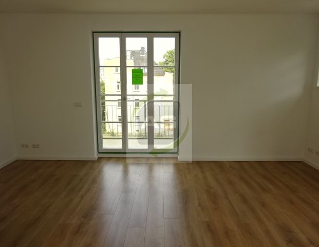 Entspannt Wohnen mit Balkon & Lift - Foto 1