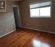 1129 WINDBROOK GROVE - Photo 2