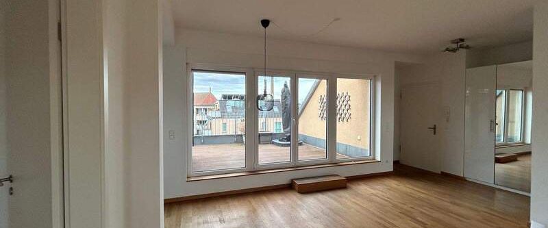 Moderne 2 Zimmer Dachgeschosswohnung in schönem Wohnensemble - Foto 1