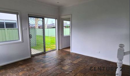 Spacious 4-Bedroom Family Home in a Great Location! - Photo 4