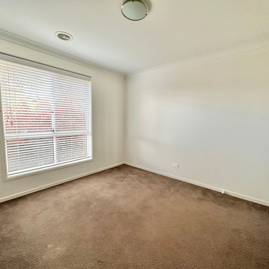 Modern Four Bedroom Home in a Desirable Location! - Photo 1