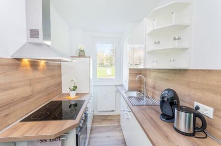 2-Raum-Wohnung mit Einbauküche, Aufzug, Balkon, Bad mit ebenerdiger Dusche! - Photo 4